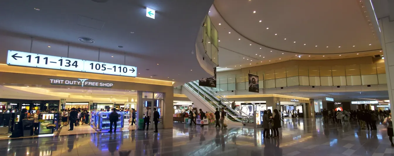 Duty-free shopping area in the international terminal at Tokyo Haneda Airport, where arriving and departing travellers buy tobacco and spirits