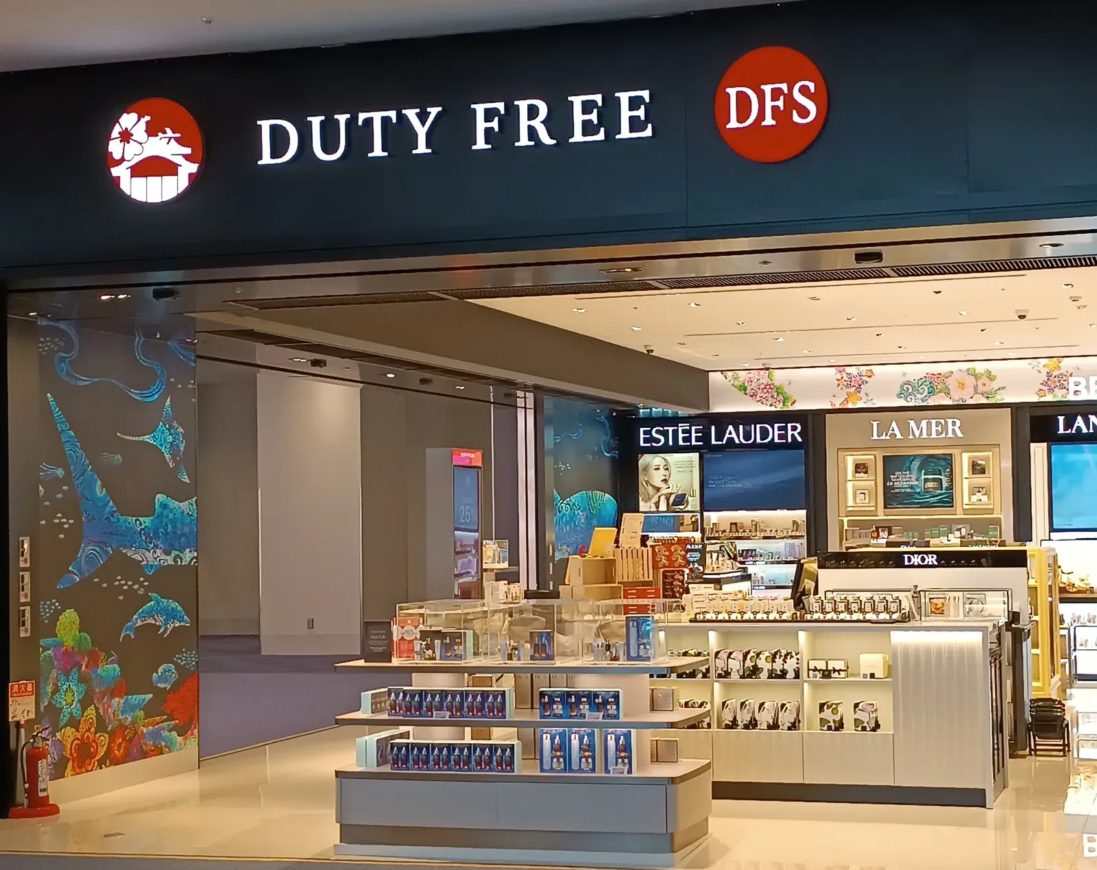 The DFS duty-free shop in the departure zone of Naha Airport, its entrance sign reading DUTY FREE