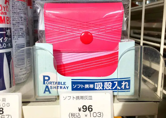 Shelf of portable pocket ashtrays at Tokyo convenience store