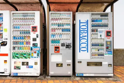 Japanese cigarette vending machine with Taspo card reader panel