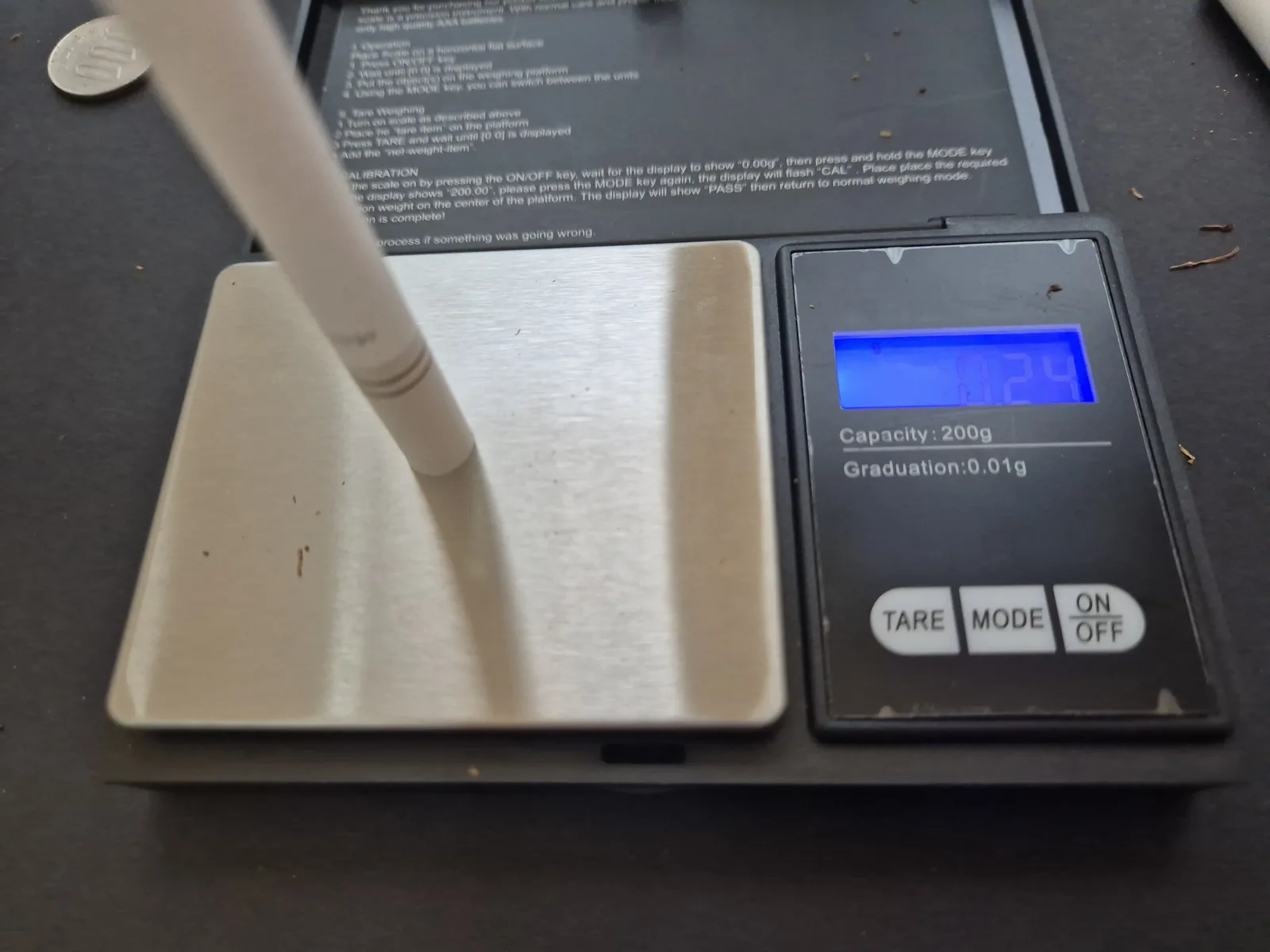 8mmフィルター付きの空のキングサイズチューブをスケールに載せて0.24g
