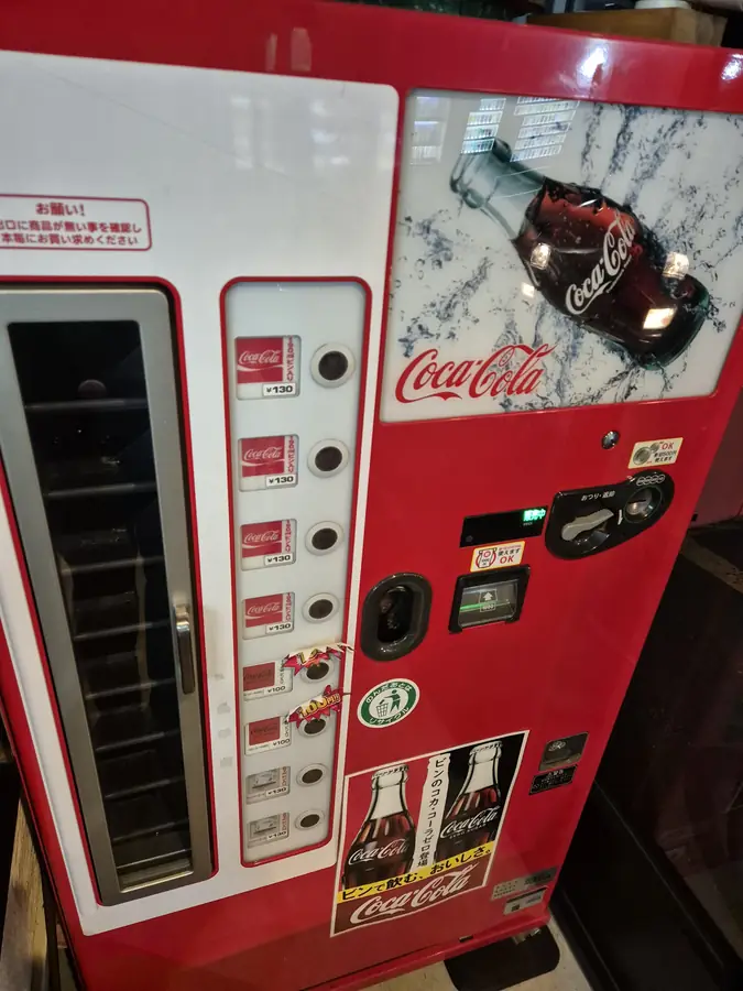 Retro Coca-Cola glass-bottle vending machine, inside the store only — KONYA Tobacco House, Kushiro, Hokkaido