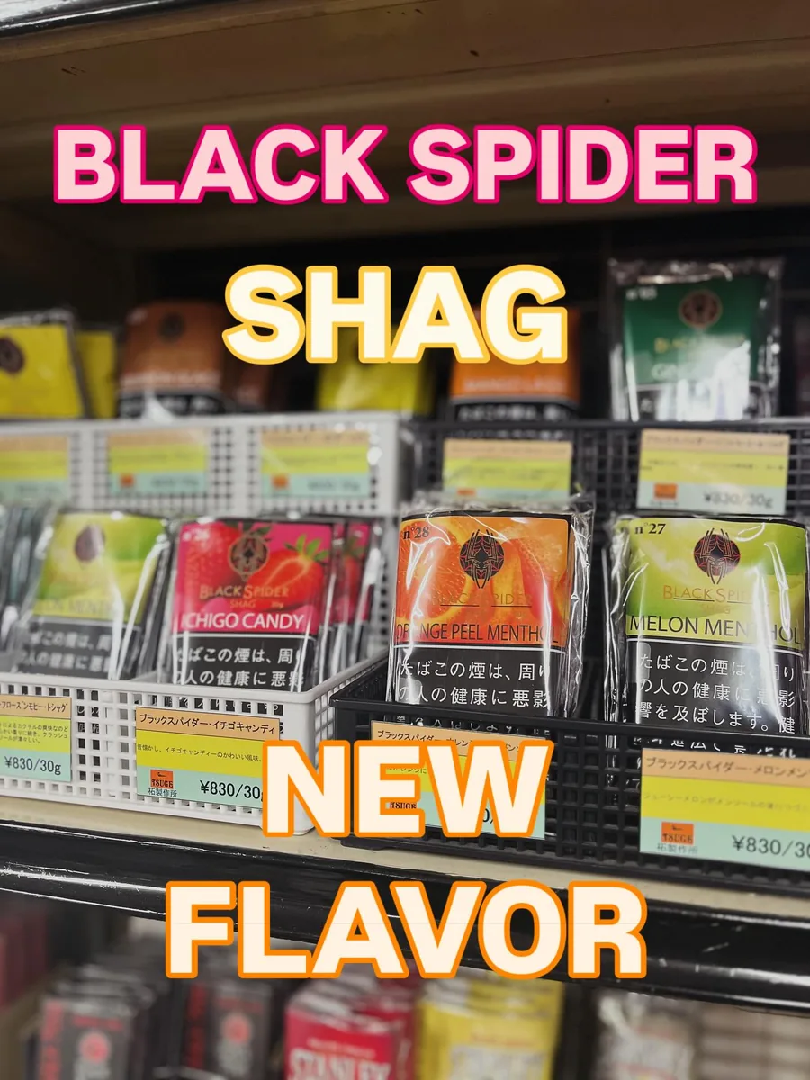가게 선반에 놓인 Black Spider Shag 롤링 담배(Ichigo Candy, Orange Peel Menthol, Melon Menthol) — 가게의 게시글에 “NEW FLAVOR”라고 적힌 신제품 라인 — Shiraishi Store, Mizumaki